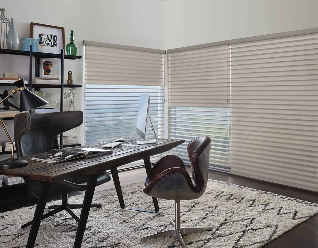 Hunter Douglas Silhouette® Sheer Shades hung at a window in a home office